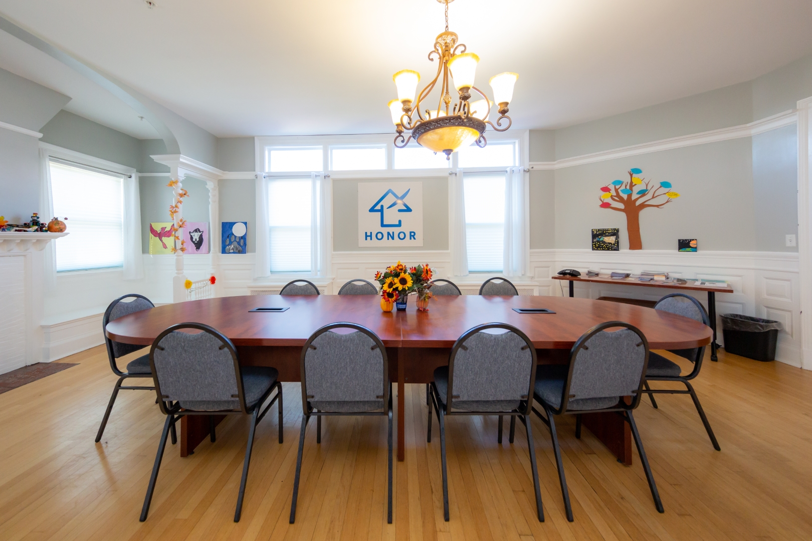 Table inside of the building building with HONOR sign showing